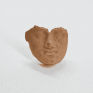 4_volto_in_terracotta.png